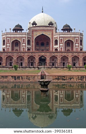 Humayun's Tomb. Islamic mausoleum. Large red sandstone building decorated with inlaid white marble. Delhi India
