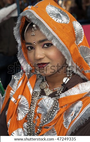 HARYANA, INDIA - FEBRUARY 15: Indian lady in tribal dress on February 15 2007 at the Surajkund Fair in Haryana near Delhi, India