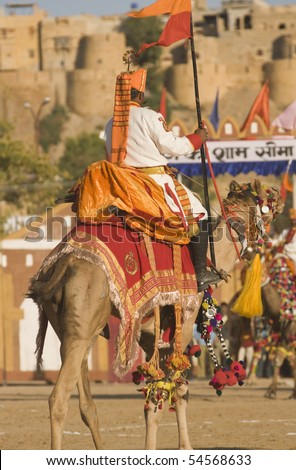 JAISALMER, INDIA - FEBRUARY 20: Camel and rider of the Indian Army on display at the Desert Festival on February 20, 2008 in Jaisalmer Rajasthan, India.