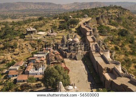 Massive ramparts of Kumbhalgarh Fort, Rajasthan, India. Village and temples inside the walls