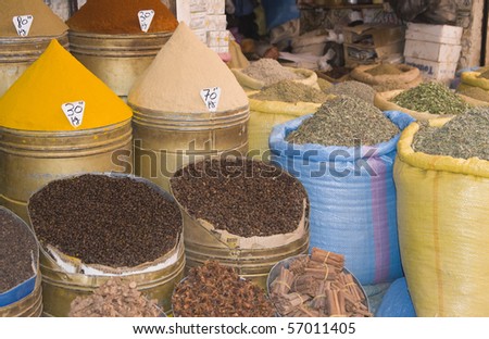 Containers of herbs and spices for sale in a shop in the historic heart of Marrakesh, Morocco