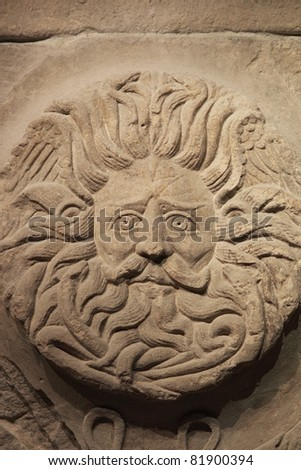 The Gorgon\'s Head from the ancient Roman Temple of Sulis Minerva at the Roman Baths in Bath, Somerset, England.