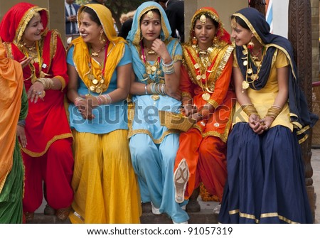 HARYANA INDIA FEBRUARY 15 Group of colorfully tribal dress Indian dancers from the Punjab area of India on February 15 2007 at the annual Surajkund Fair in Haryana India HARYANA INDIA FEBRUARY 15 Group of colorfully tribal dress Indian dancers from the Punjab area of India on February 15 2007 at the annual Surajkund Fair in Haryana India