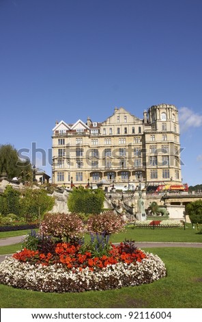 BATH, UNITED KINGDOM - AUGUST 28: Parade Gardens on August 28, 2010 in Bath, Somerset, England. Empire Hotel in the background.