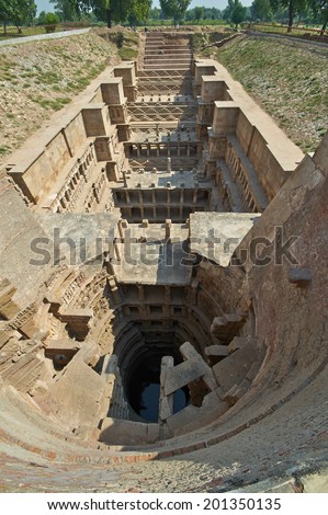 Ornate stone carved walls lining the 11th century Rav-Ki-Vav stepwell at Patan, Gujarat, India. Selected as a UNESCO world Heritage Site in June 2014.