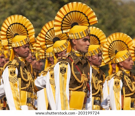 NEW DELHI, INDIA - JANUARY 23, 2008: Soldiers in bright yellow trimmed uniform parading down the Raj Path in preparation for the annual Republic Day Parade in New Delhi, India