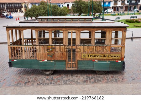 CUSCO, PERU - AUGUST 28, 2014: Wooden tram used to take tourists around the historic city of Cusco in Peru
