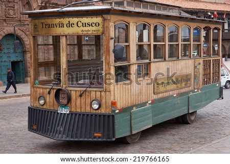 CUSCO, PERU - AUGUST 28, 2014: Wooden tram used to take tourists around the historic city of Cusco in Peru