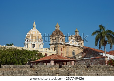 Walled city of Cartagena de Indias in Colombia. Fortifications surround Spanish colonial era churches, cathedrals and houses of what is now a UNESCO World Heritage Site.
