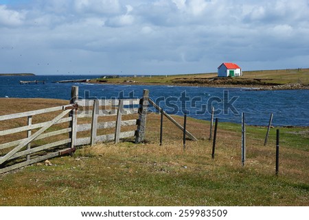 Farm buildings on the coast of Bleaker Island in the Falkland Islands