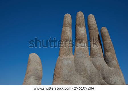 Giant hand sculpture in the Atacama Desert alongside Route 5 close to Antofagasta, Chile.
