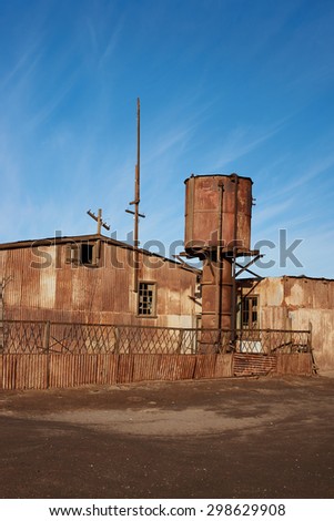 HUMBERSTONE, CHILE - JULY 1, 2015: Derelict and rusting industrial buildings at the historic Humberstone Saltpeter Works in the Atacama Desert near Iquique in Chile. A Unesco World Heritage SIte.