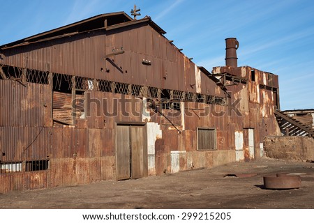 HUMBERSTONE, CHILE - JULY 1, 2015: Derelict and rusting industrial buildings at the historic Humberstone Saltpeter Works in the Atacama Desert near Iquique in Chile. A Unesco World Heritage SIte.