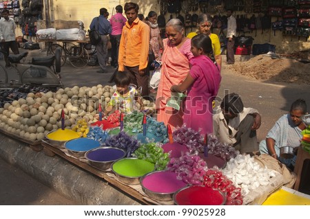 AHMADABAD, INDIA - OCTOBER 30: Stall selling colorful paint powder for the Hindu festival of Holi at a crowded market on October 30, 2007 in Ahmadabad, Gujarat, India