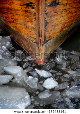 Boat bow through ice flakes - icebreaker