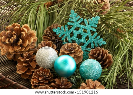 Teal Decorations and Pine Cones Teal holiday decorations with pine cones and fresh cut pine branches.