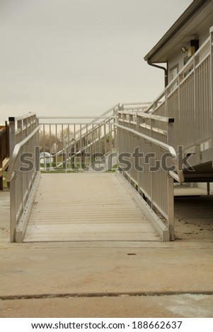 Accessibility Ramp Outdoor metal wheelchair access ramp.