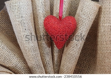 Burlap and Beaded Heart Fantastic red beaded heart with a burlap background.