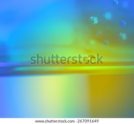 Abstract background with water drop at blue and yellow colours in photoshop