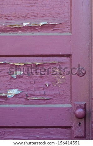 pURPLE DOOR WITH PEELING PAINT