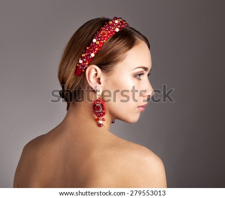 Woman  With The Hoop And Stylish Earrings