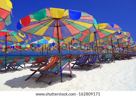Camp Bed under colorful umbrella on the beach, Khai Island, Phang Nga, Phuket, Thailand