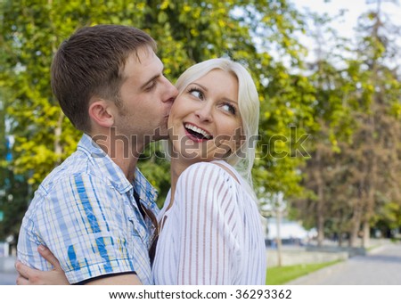 stock-photo-the-guy-kisses-the-beautiful-girl-the-blonde-36293362.jpg