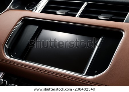 Panel of modern car. Touch screen multimedia system.