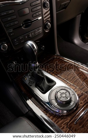 Gear shift in car. Detail interior of modern auto.