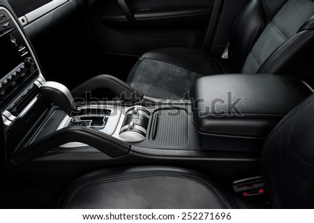 Automatic transmission gear shift. Modern car interior detail.