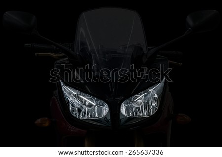 Modern motorcycle head light with two bulbs.