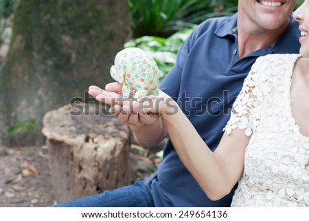 Couple Hold Small Elephant Toy
