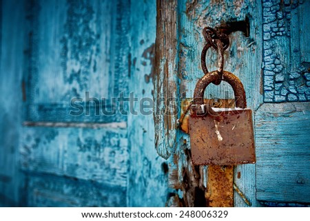 padlock on an old door