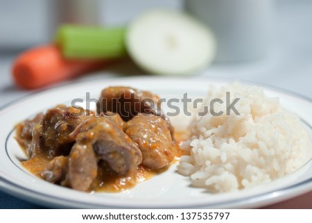 turkey stew with rice, typical Italian dish of turkey stew accompanied by boiled rice