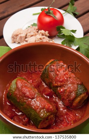 Zucchini stuffed with tuna, A typical dish of traditional Roman and Italian cuisine made from zucchini, tuna, bread crumbs and tomato sauce