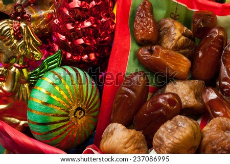Dry figs and dates with Christmas decorations