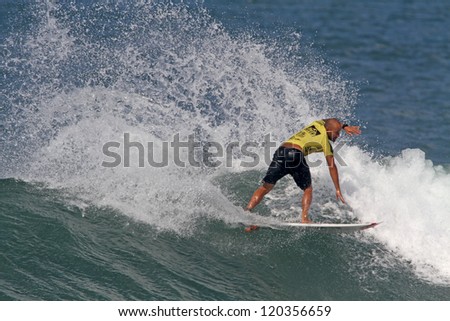 HAWAII - NOVEMBER 24: Fred Patacchia takes third place at the Reef Hawaiian Pro, stage one of the Vans Triple Crown of Surfing November 24, 2012 at Haliewa Beach Park.
