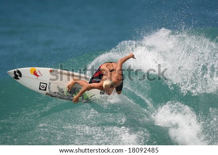Hawaii - Oct. 23: Pro women\'s surfer Keala Kennelly rips a wave Oct. 23, 2007 at Off The Wall, Hawaii. She is one of the best pro women surfers on the tour.