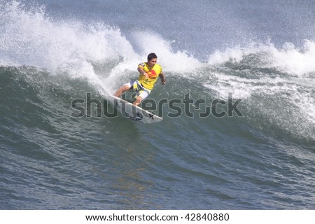 HAWAII- NOVEMBER 22: Joel Centieo surfs his way to victory at the 2009 Reef Hawaiian Pro on November 22 at Haleiwa Beach, Hawaii.
