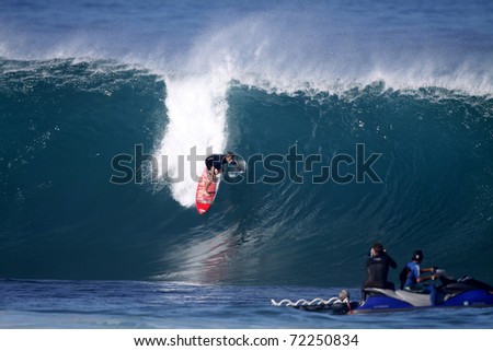 HAWAII - JANUARY 5: Mark Healey competes in Da Hui\'s Backdoor Shootout at Pipeline. This is a very prestigious event with a first place prize of $40,000.  Jan. 5, 2011 on the North Shore, Hawaii.