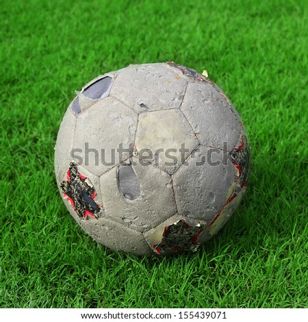 old soccer ball on the soccer field