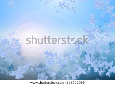 Ice butterflies on blue background for text