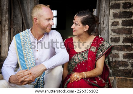 Western couple getting married in an Indian ceremony