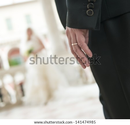 groom with ring  wait for his bride in palace balcony in Italy