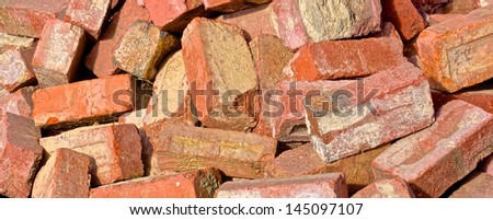 study of a pile of old red bricks from a demolished house