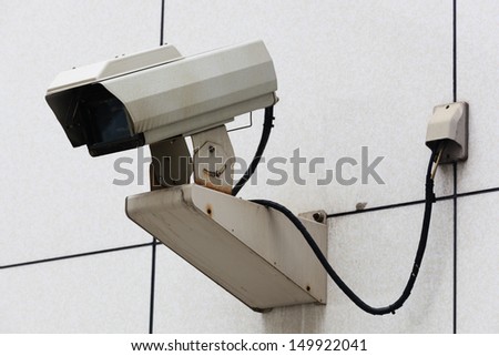 Outdoor Security Camera in a white wall