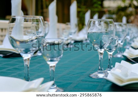Hotel service - table in a restaurant with a blue tablecloth