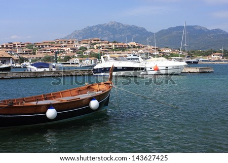 Porto Rotondo Sardinia\'s north area frequented by sports wind surfing in beautiful spring blooms of poppies tourist area for water sports Italy