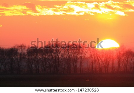 sun rising in the Po Valley