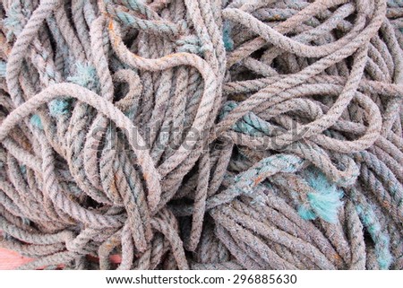 ropes and fishing creels seahouse tourist town pier for the islands of the region make northumberland england